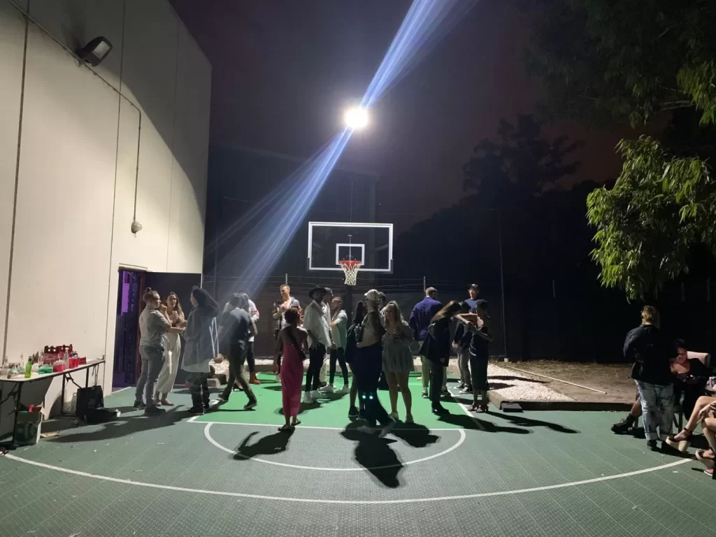 Night party on outdoor basketball court